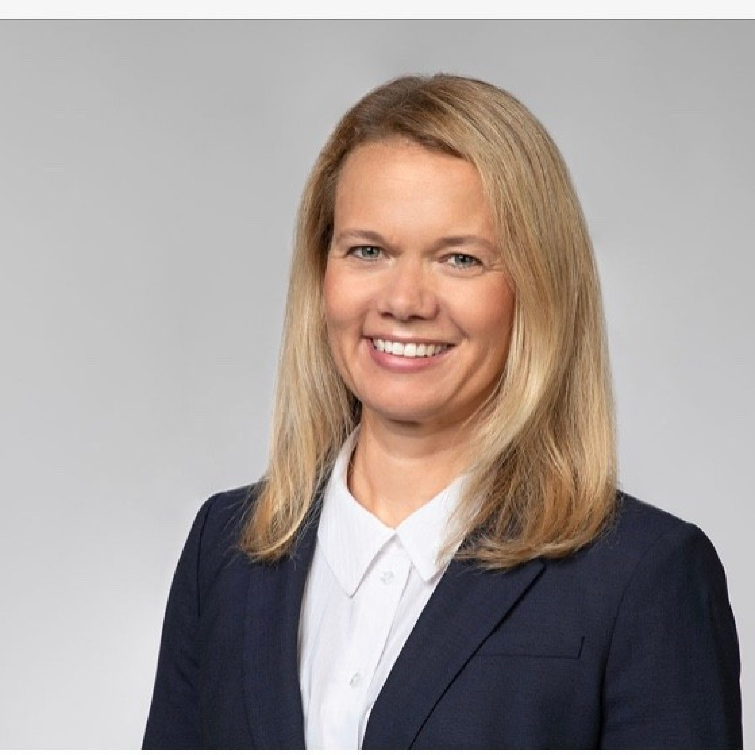 Employee looking at the camera with a smile